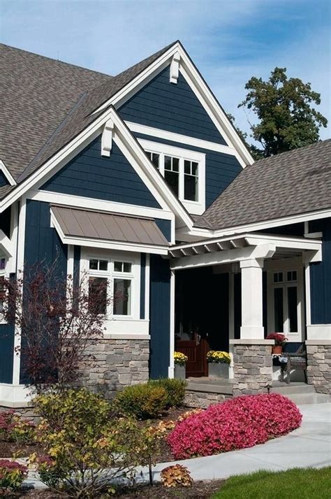 blue house white trim brown metal roof|brown roof blue exterior ideas.